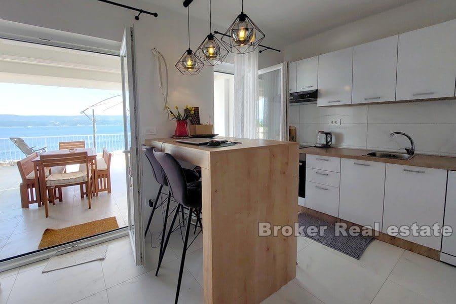 Maison jumelée au premier rang de la mer