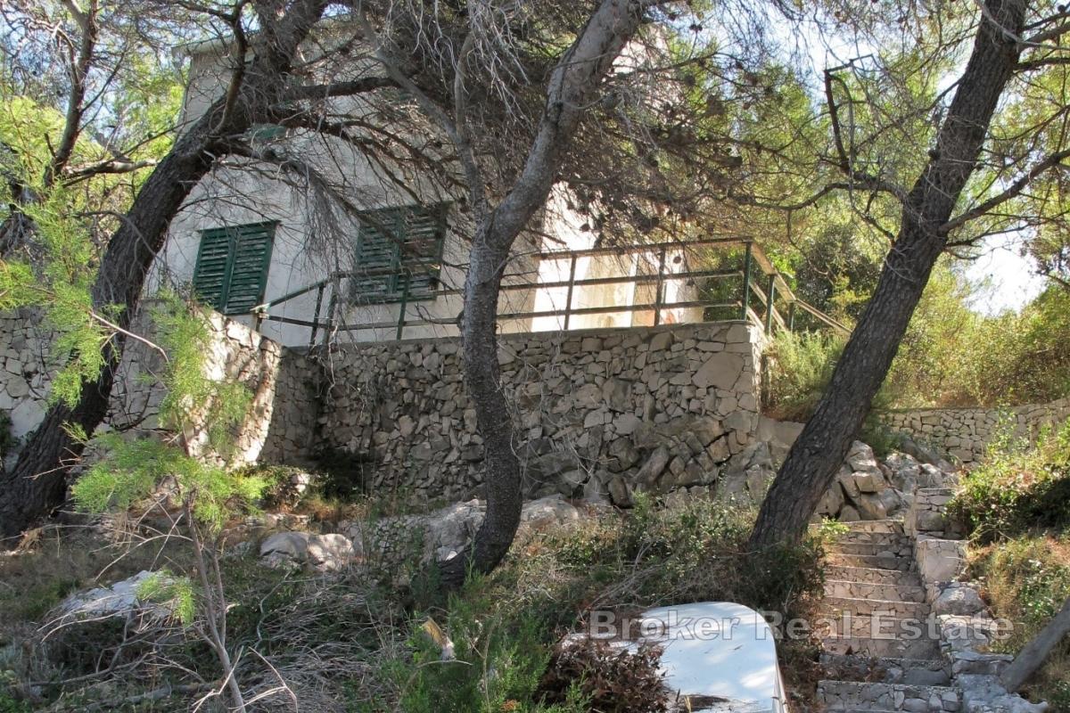 Casa con terreno in prima fila sul mare