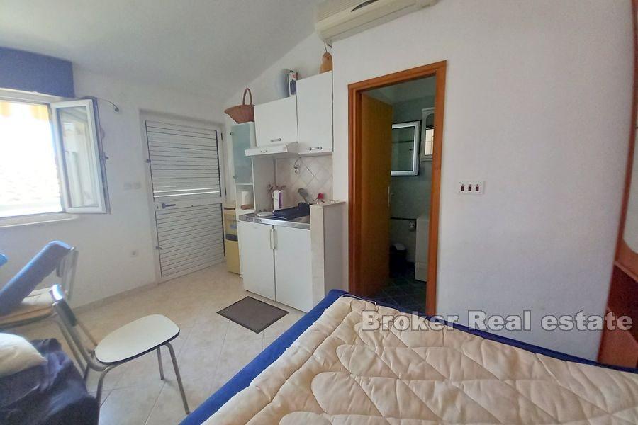 Dům a stavební pozemek s výhledem na otevřené moře