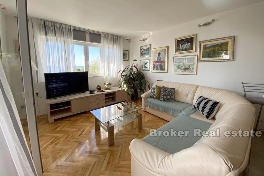 House with a pool and sea view