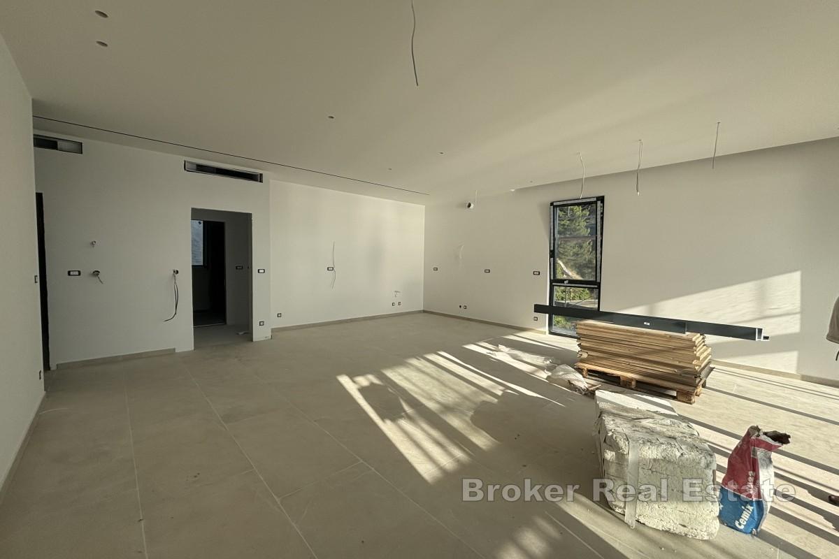 Luksusleilighet i nybygg i første rad mot sjøen