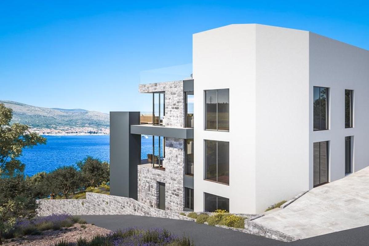 Toetasjes toppleilighet med åpen havutsikt