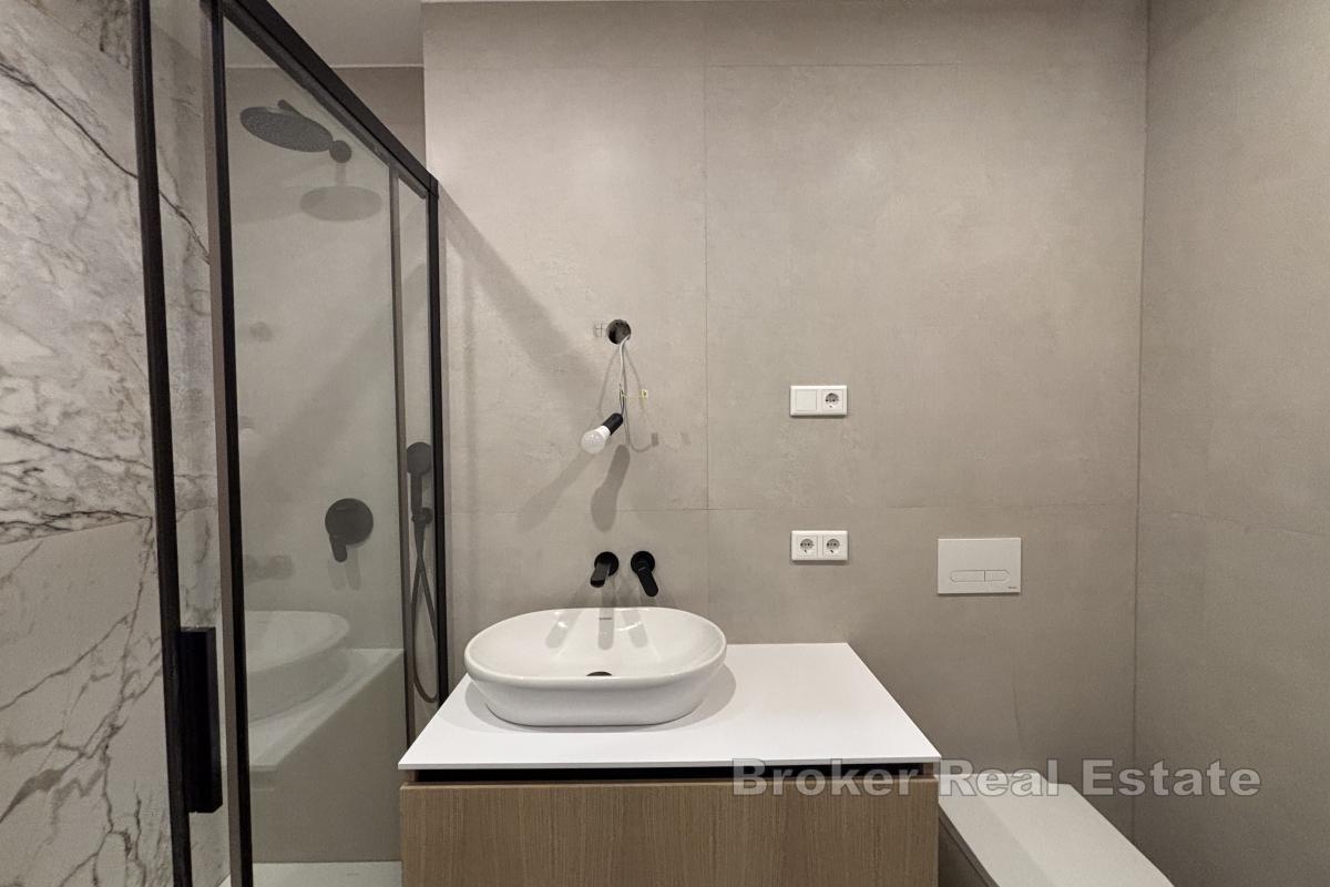 Appartement moderne de deux chambres dans un immeuble neuf bénéficiant d'un excellent emplacement