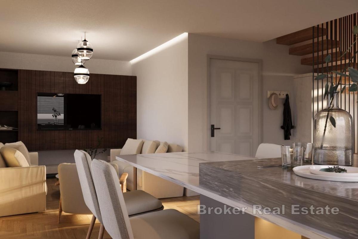 Nowoczesny, dwupoziomowy apartament typu penthouse z widokiem na otwarte morze