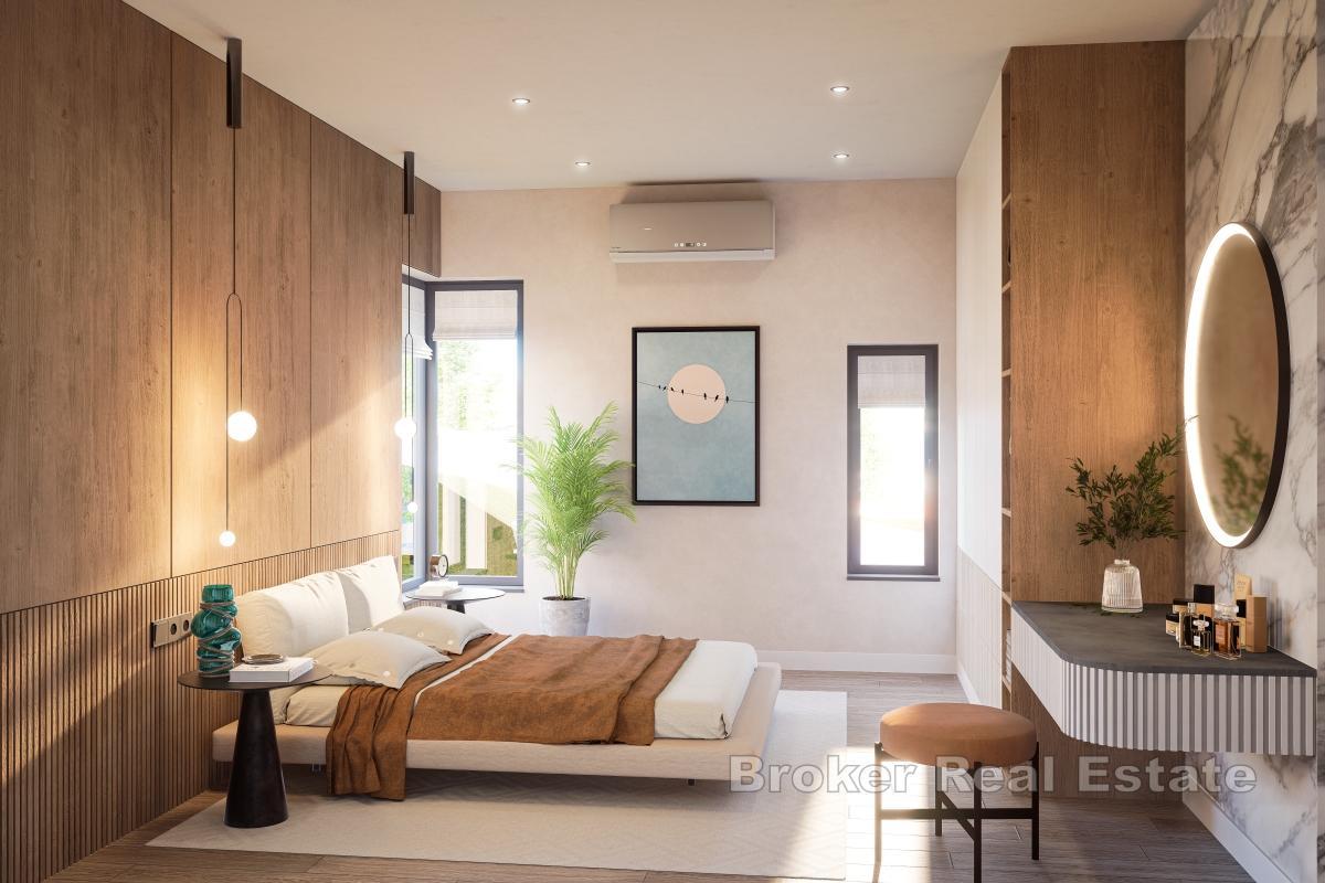 Treromsleilighet med åpen utsikt i andre rad mot havet