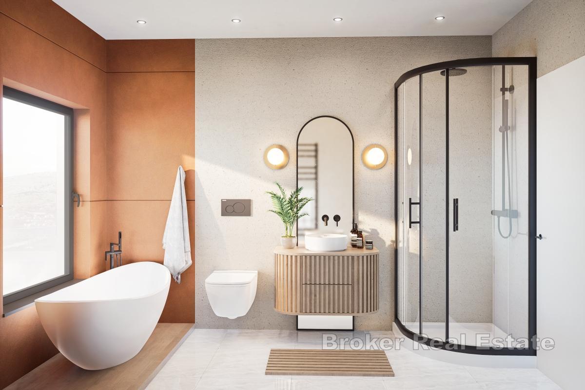 Treromsleilighet med åpen utsikt i andre rad mot havet