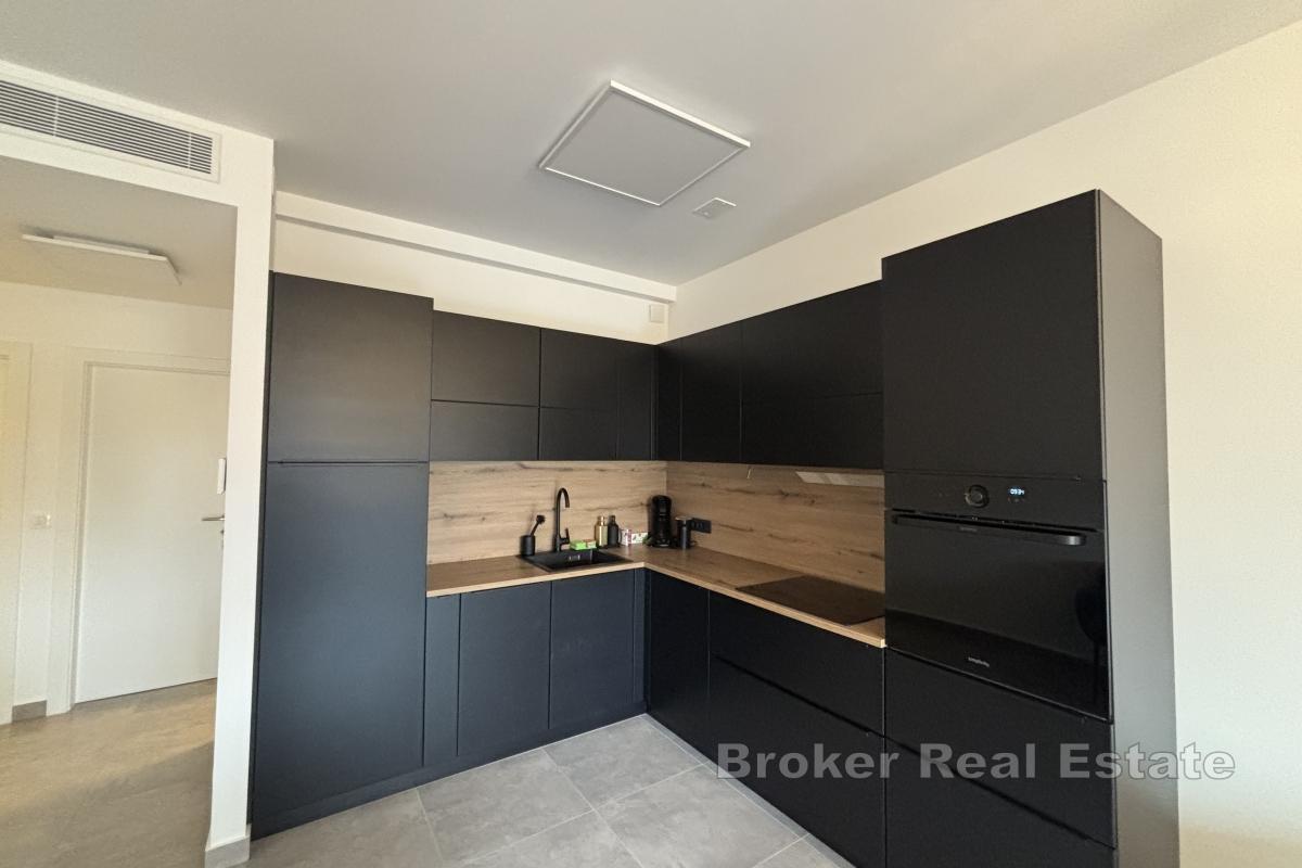 Appartement moderne de deux chambres près du centre-ville