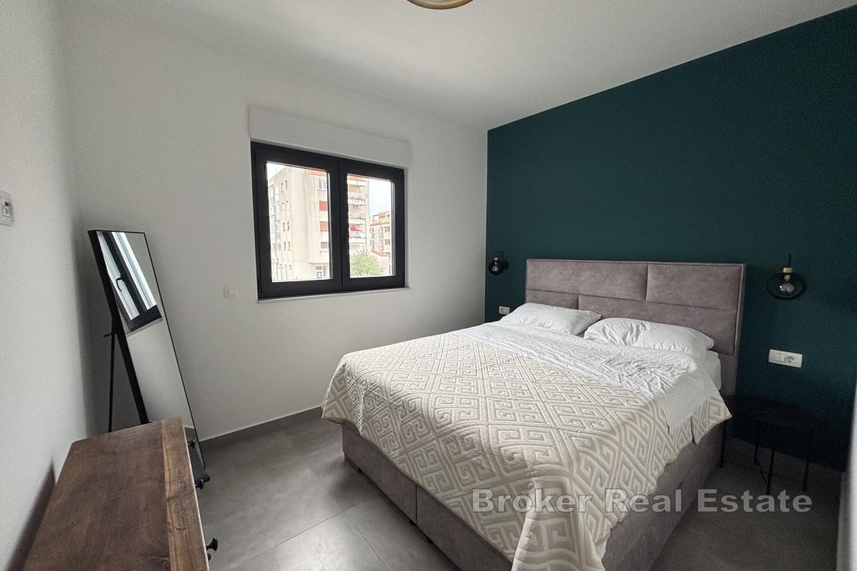 Appartement moderne de deux chambres près du centre-ville