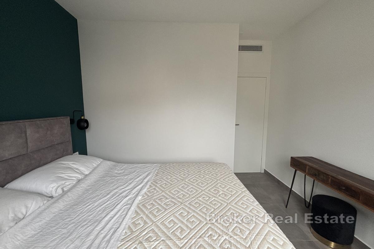 Appartement moderne de deux chambres près du centre-ville