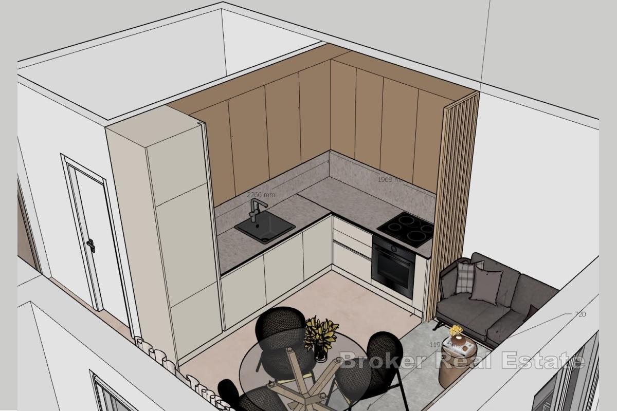 Ein-Zimmer-Apartment mit Garten und Meerblick