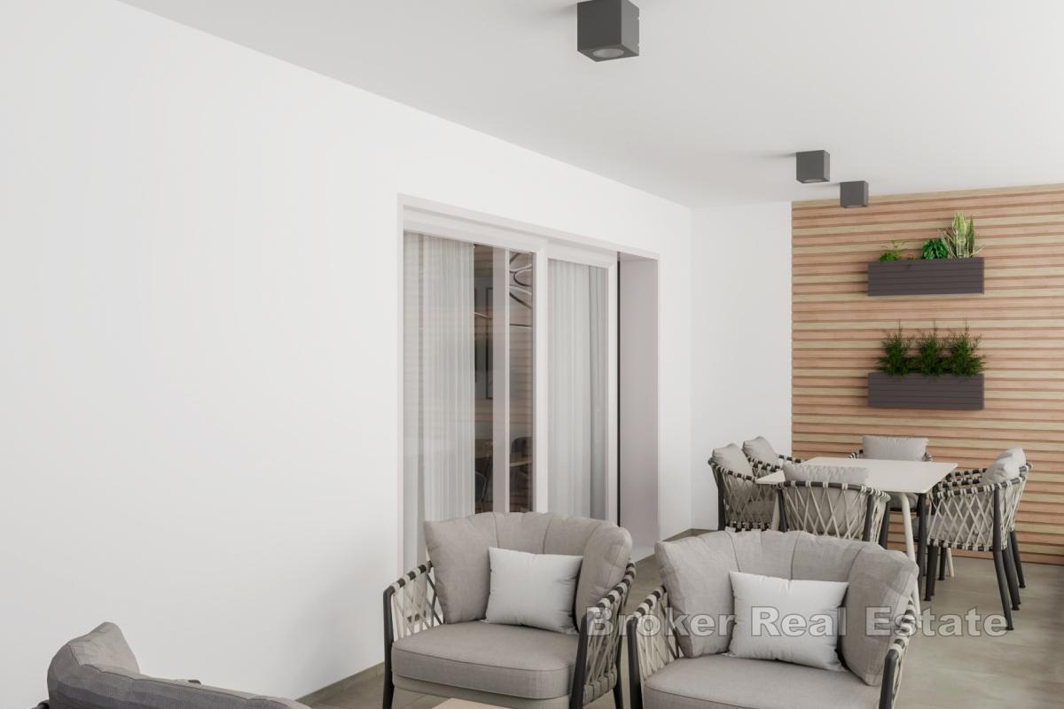 Appartamento moderno con una camera da letto e terrazza coperta