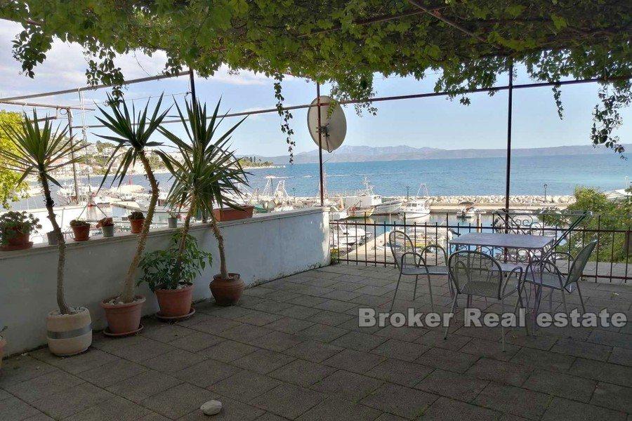 Apartment house in first row to the sea