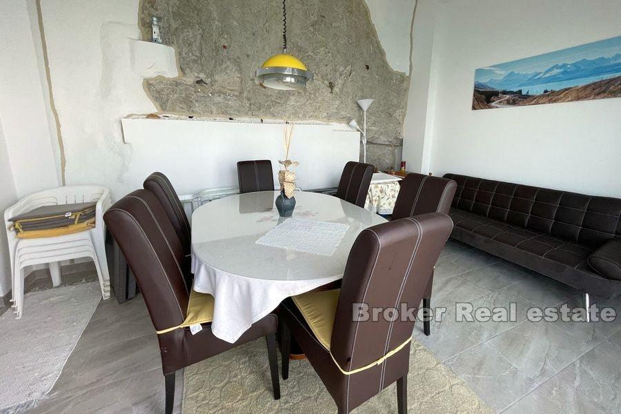 House first row by the sea