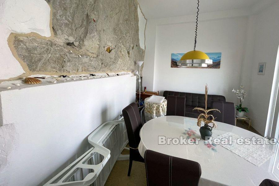 House first row by the sea