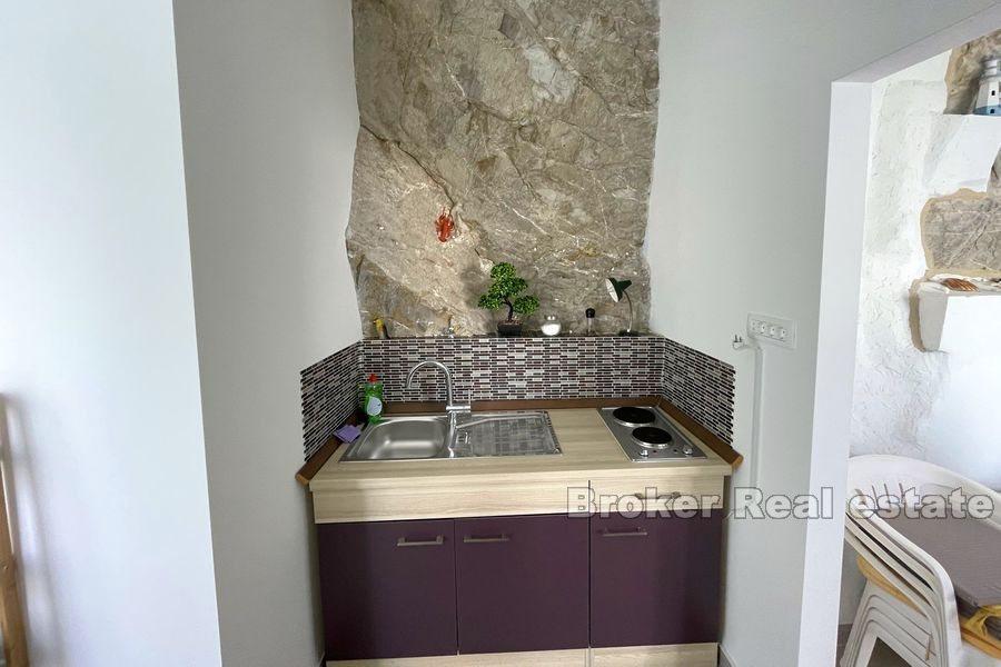 House first row by the sea