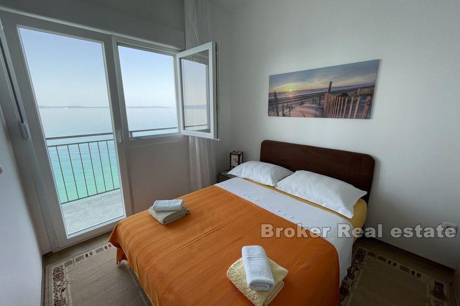 House first row by the sea