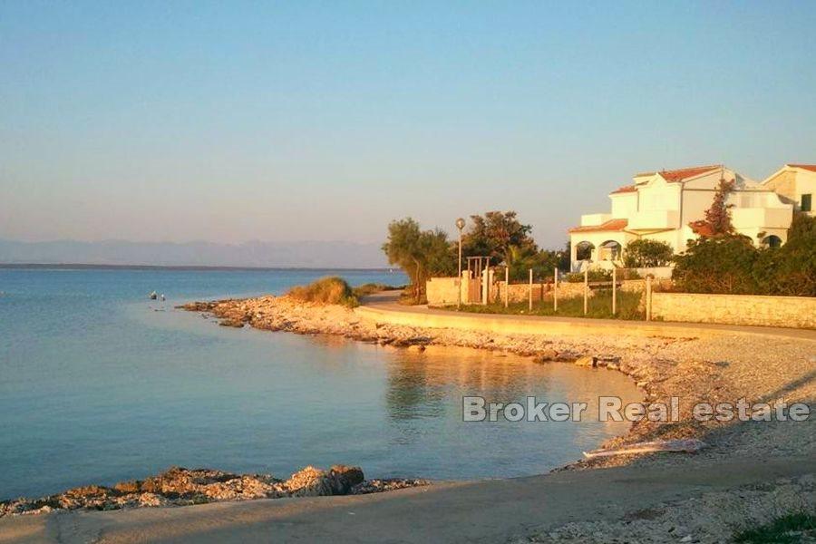 Apartment house first row to the sea