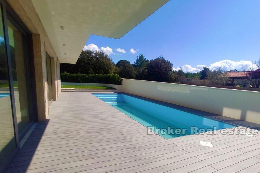 Modern villa with a pool and sea view
