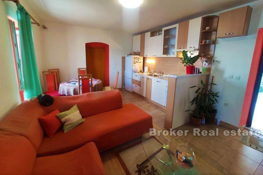 Traditional stone house first row to the sea