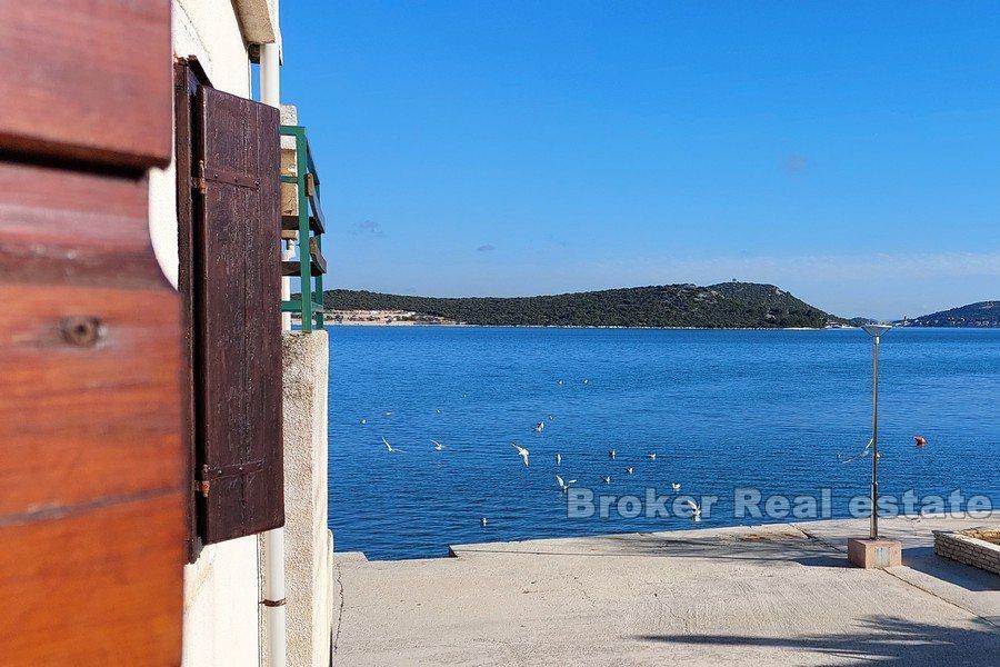 House for renovation, first row to the sea