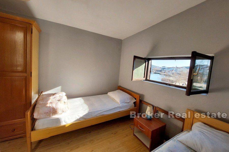 House for renovation, first row to the sea