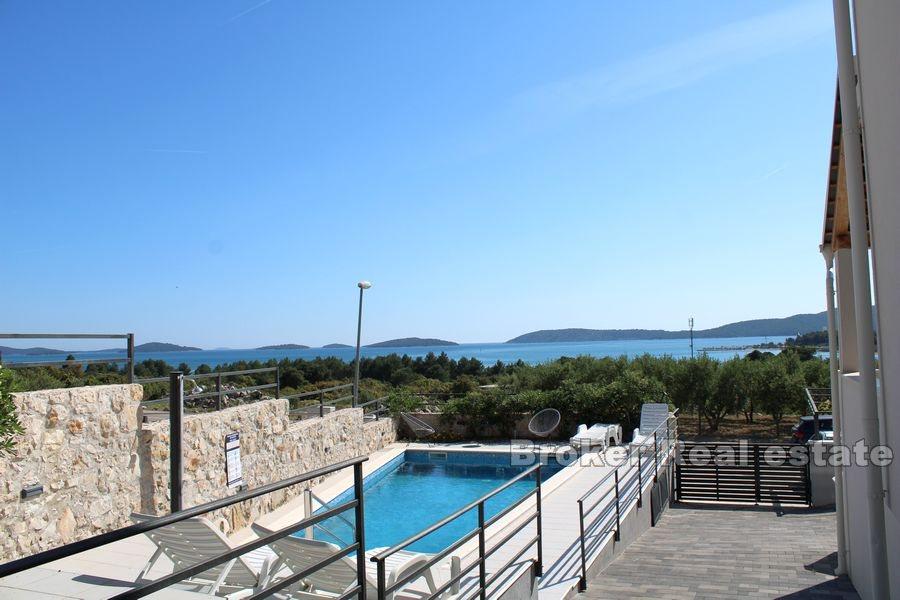 House with pool and open sea view