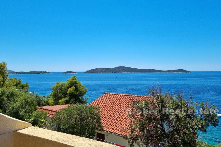 Detached house with an open sea view