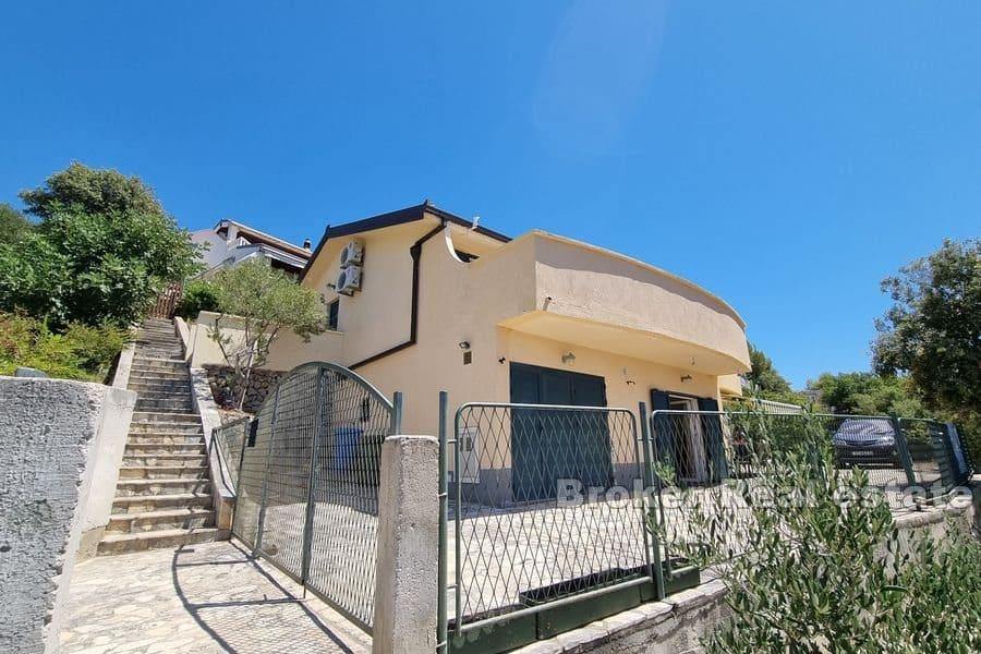Detached house with an open sea view