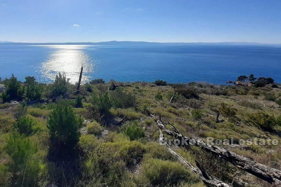 Byggnadstomt med panoramautsikt över havet
