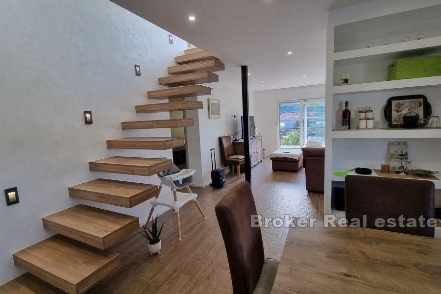 A modern house with a view of the sea