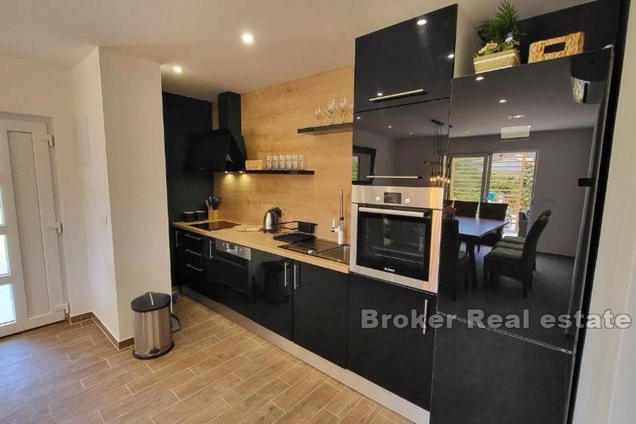 A modern house with a view of the sea