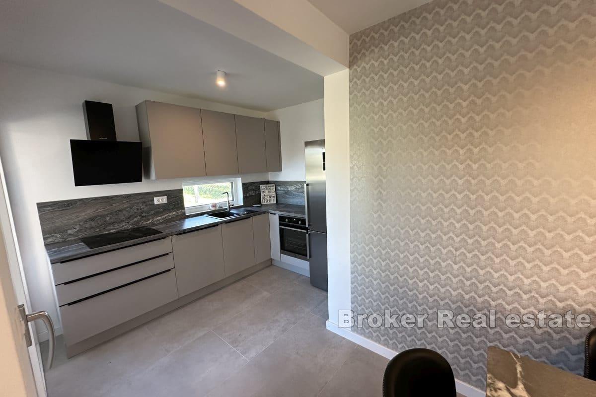 Duplex apartment with a roof terrace in a new building
