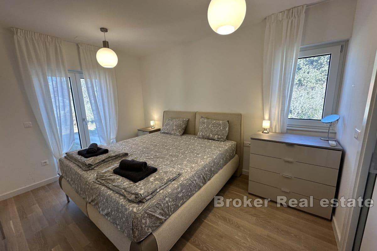 Duplex apartment with a roof terrace in a new building