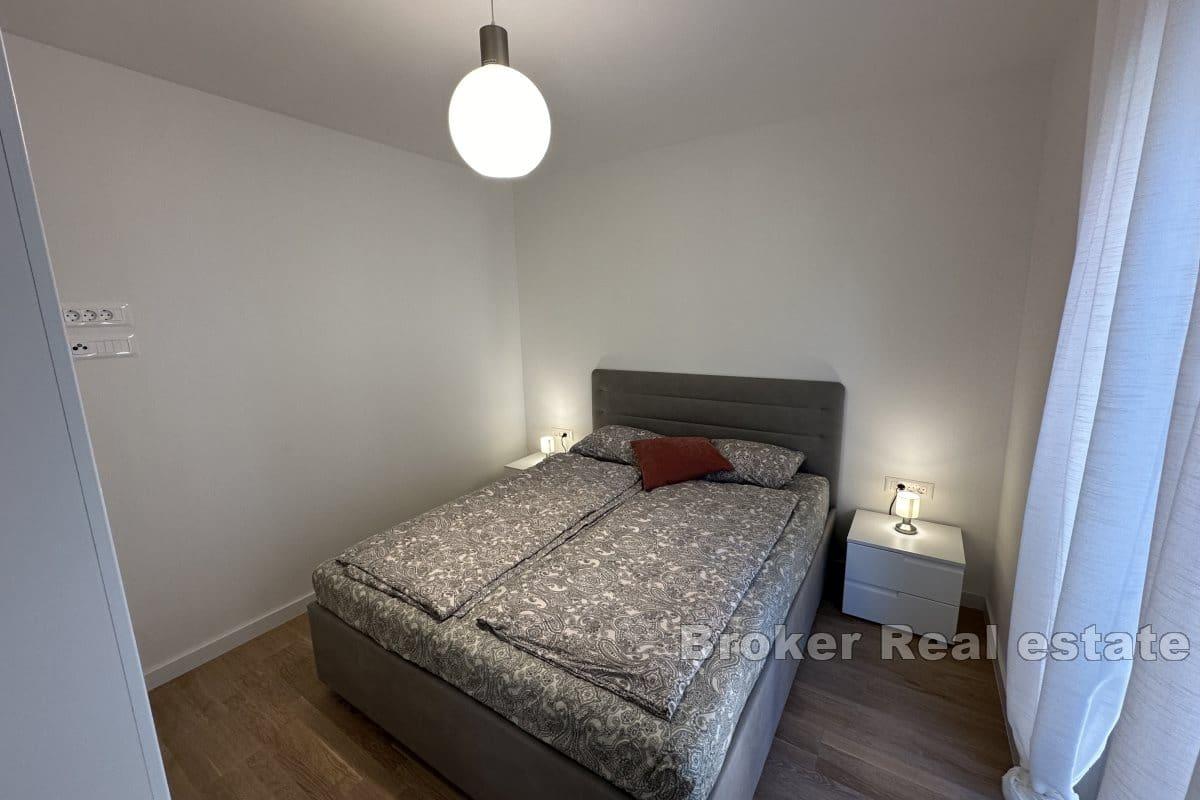 Duplex apartment with a roof terrace in a new building
