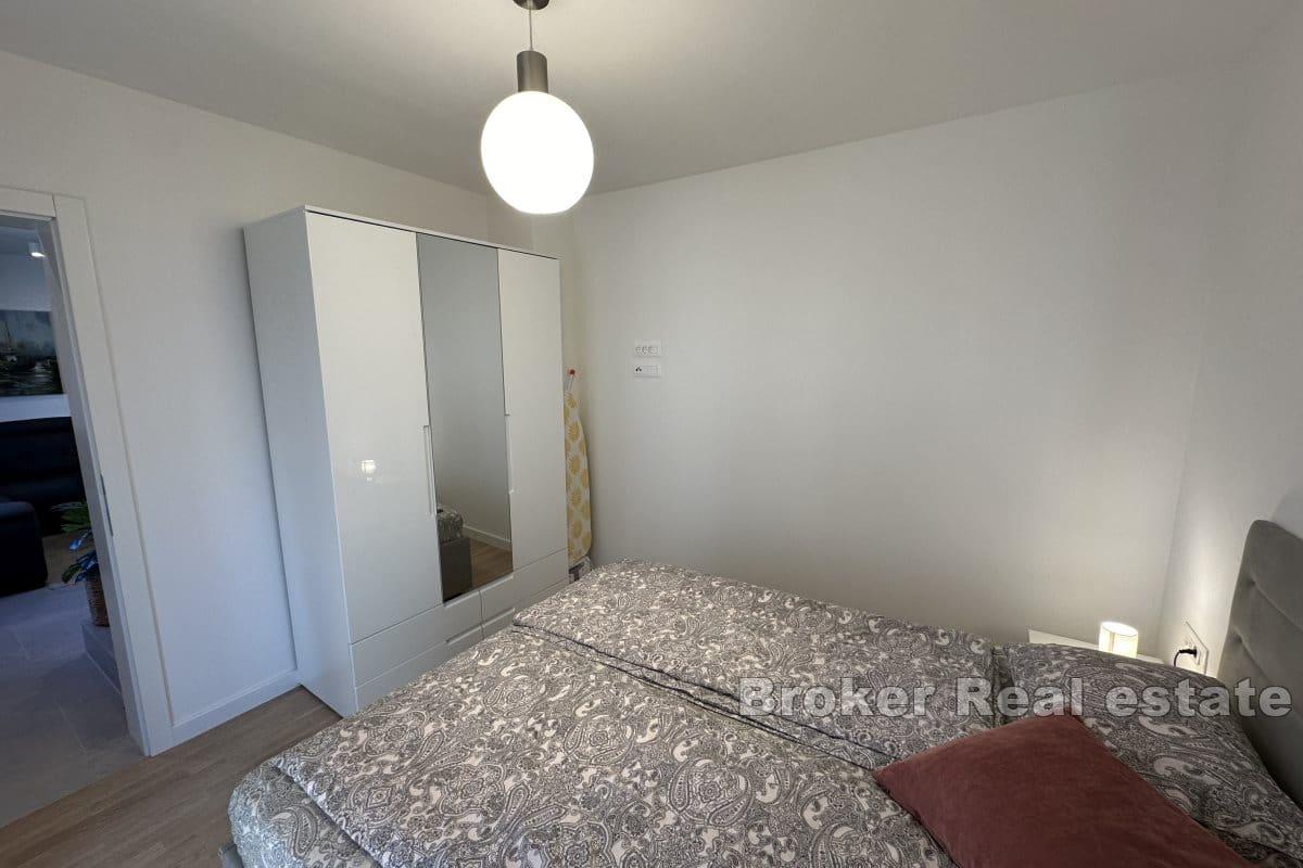 Duplex apartment with a roof terrace in a new building