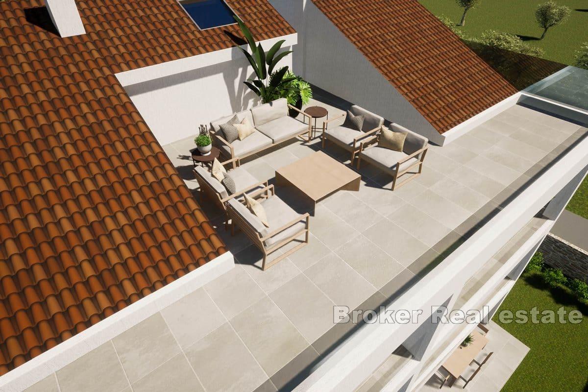 Wohnungen in einem Neubau mit Garten und Dachterrasse