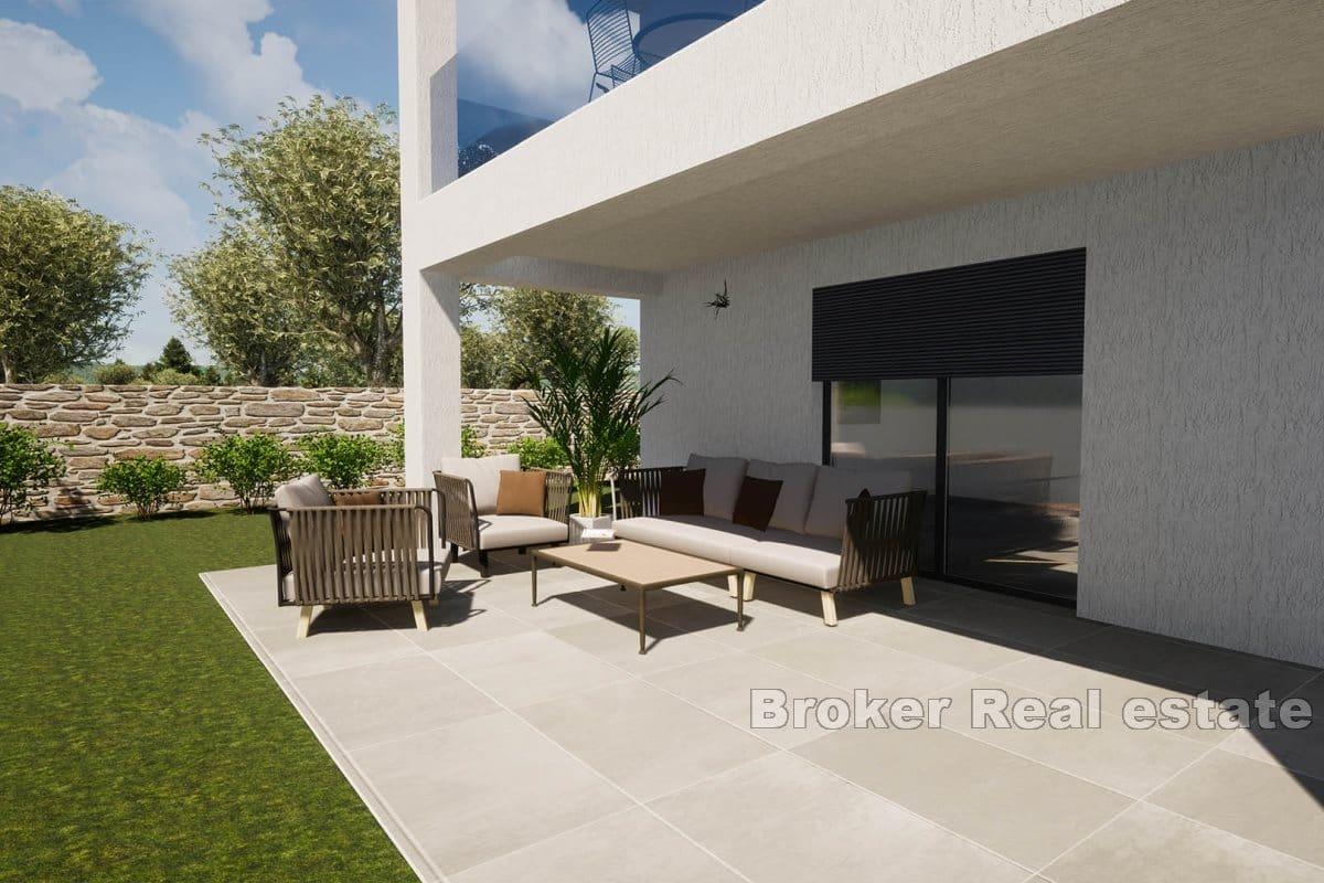 Apartments in a new building with garden and a roof terrace