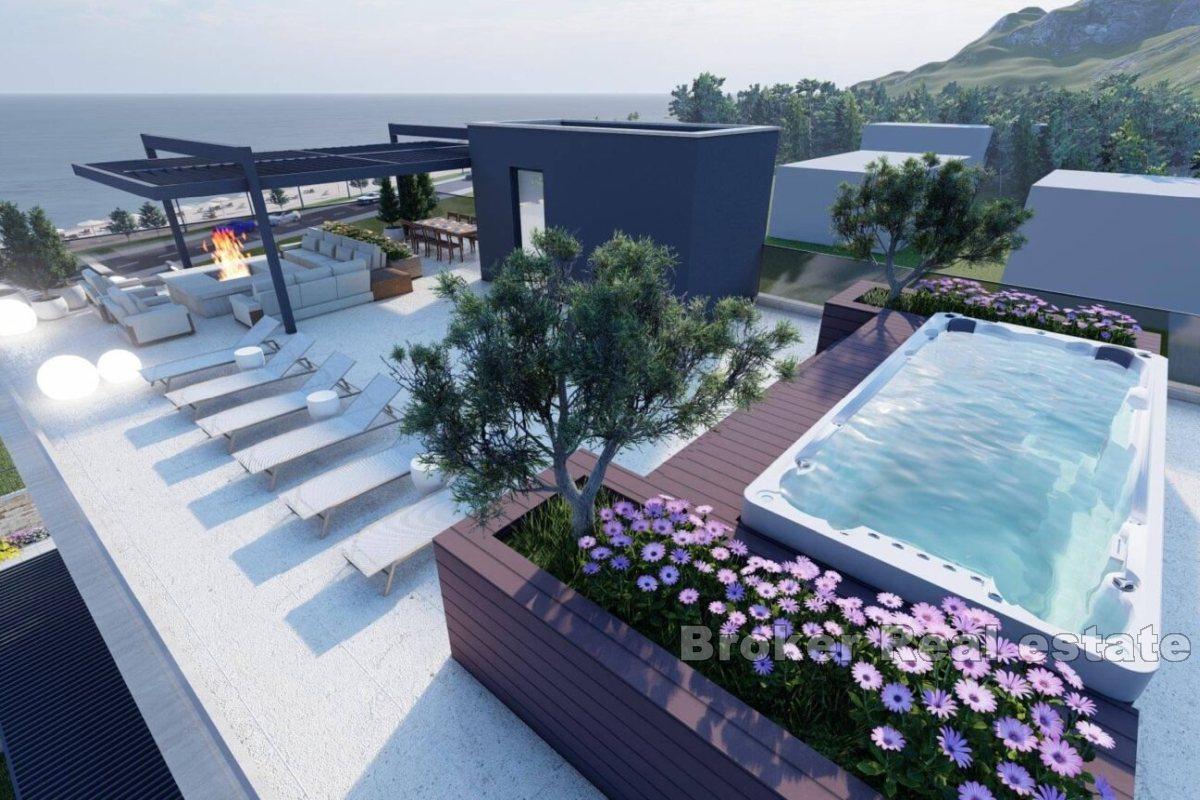 Modernes Apartment mit Dachterrasse in der ersten Reihe zum Meer