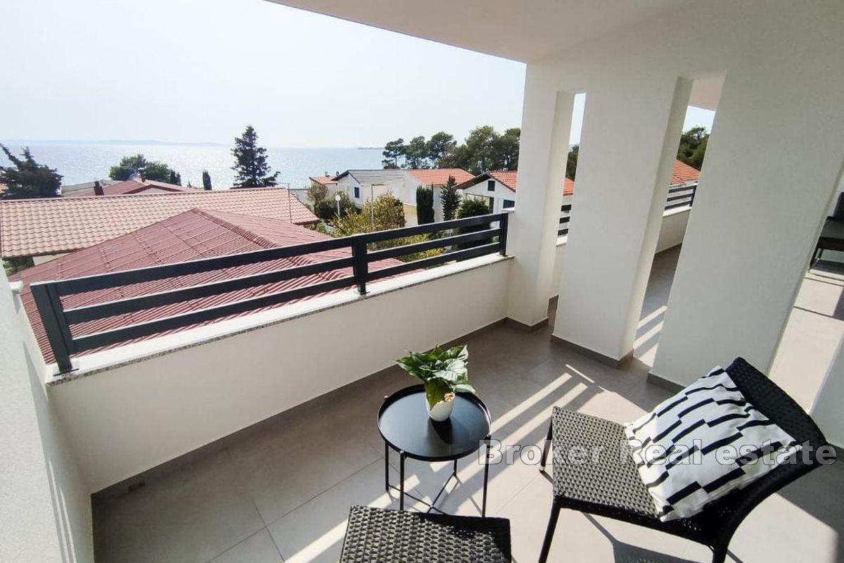 001-2043-115-Island-of-Vir-Apartment-house-with-commercial-space-and-land-for-sale