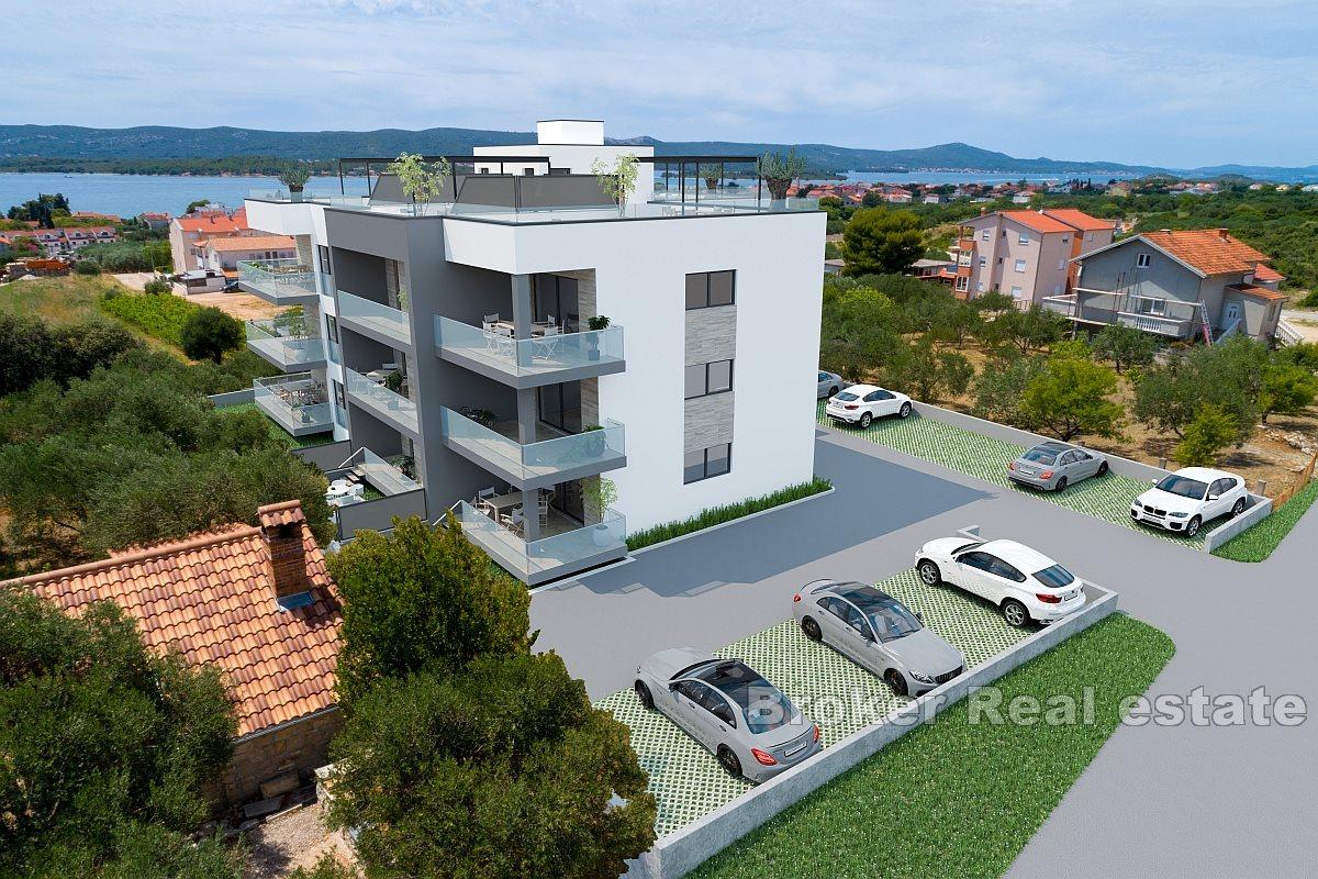 Penthouse with a roof terrace and open sea view