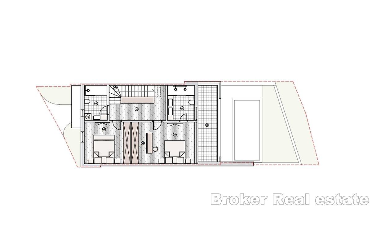 Nově postavený dům v řadě s otevřeným výhledem na moře
