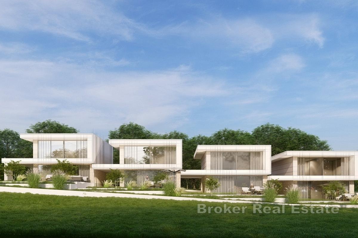Modern ny byggnad med pool och havsutsikt