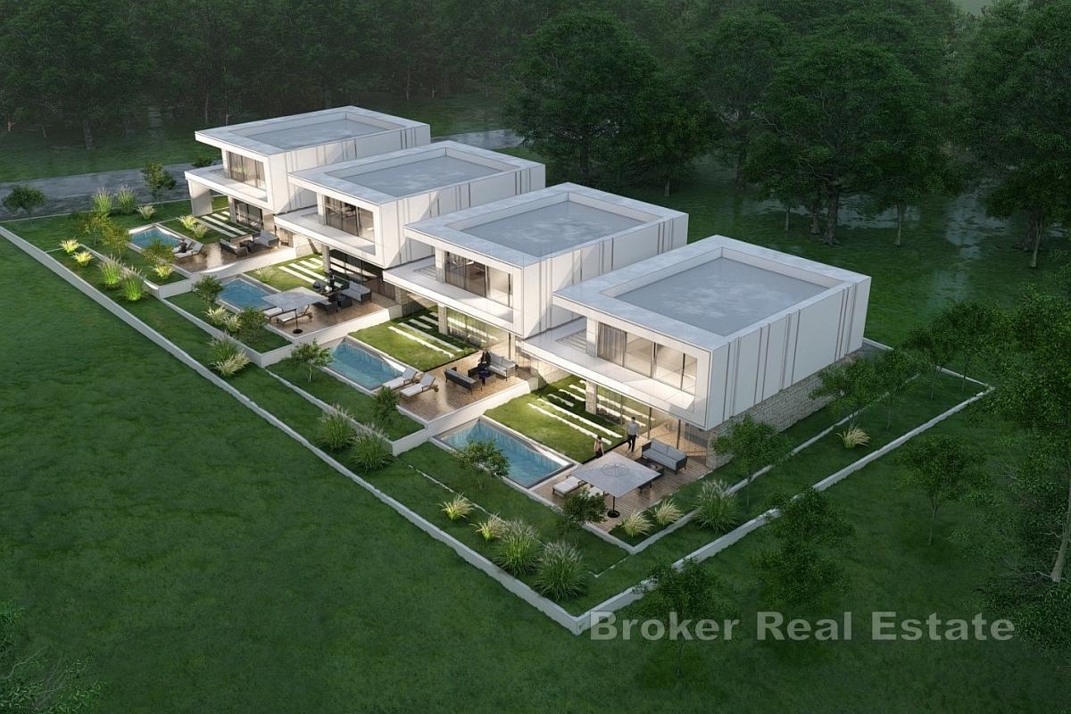 Modern ny byggnad med pool och havsutsikt