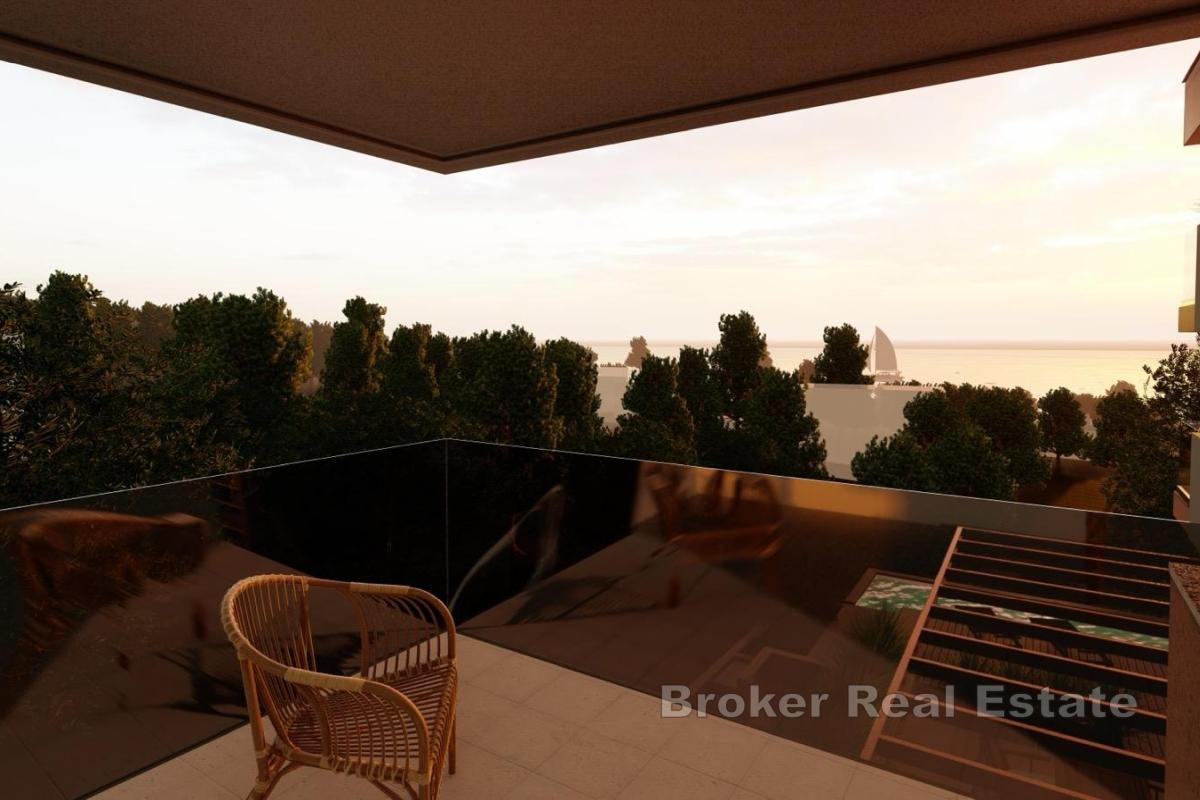 Moderno appartamento con due camere da letto in un edificio di nuova costruzione con vista mare