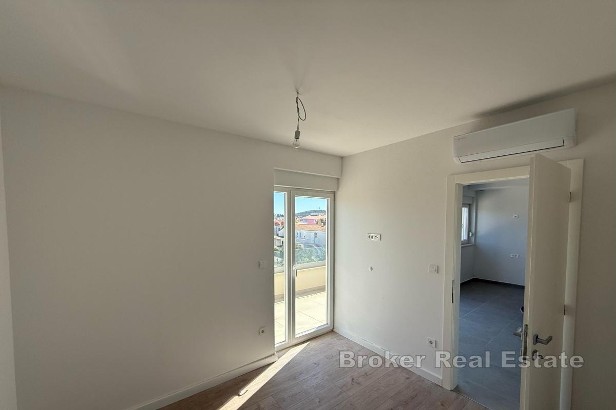 Apartmán se dvěma ložnicemi v novostavbě s parkovacím místem