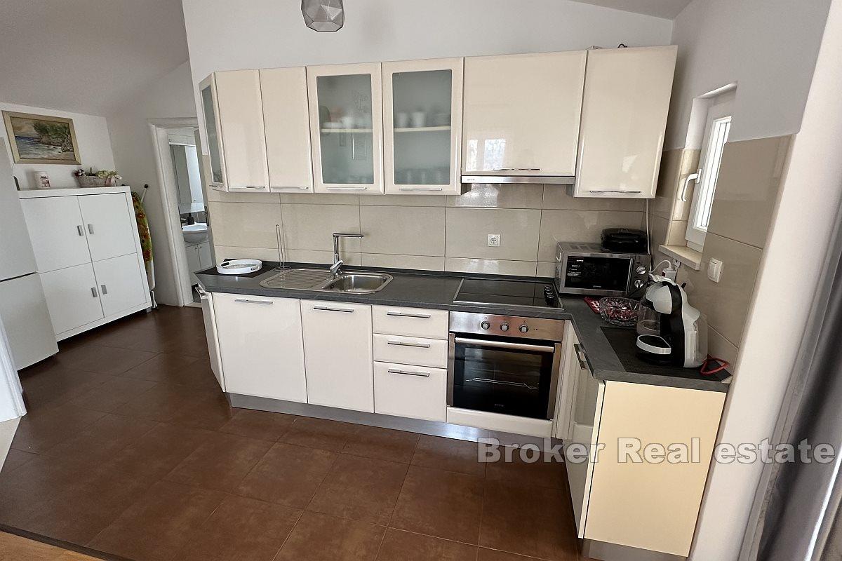 Appartement confortable de deux chambres dans un endroit calme