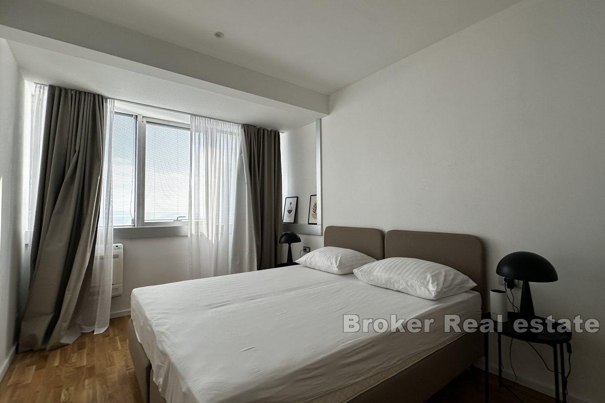 Moderno appartamento con due camere da letto e posto auto in garage