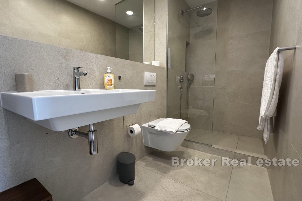 Moderno appartamento con due camere da letto e posto auto in garage