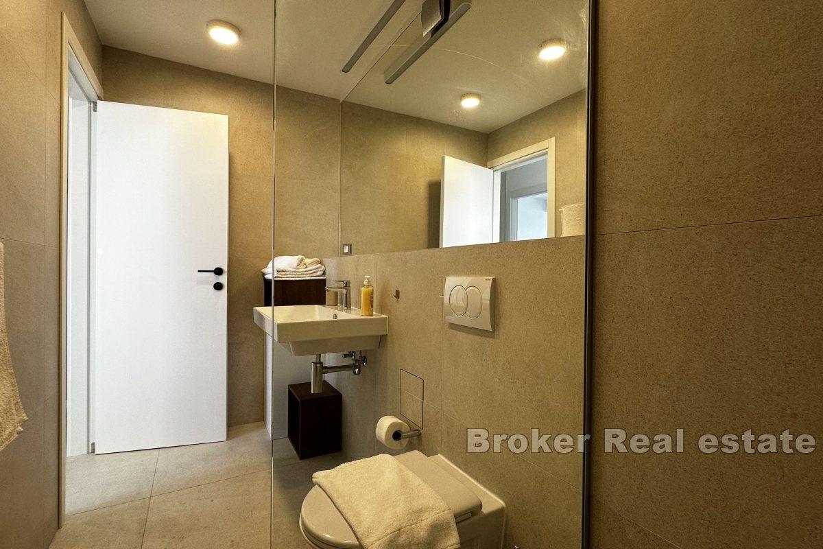 Moderno appartamento con due camere da letto e posto auto in garage