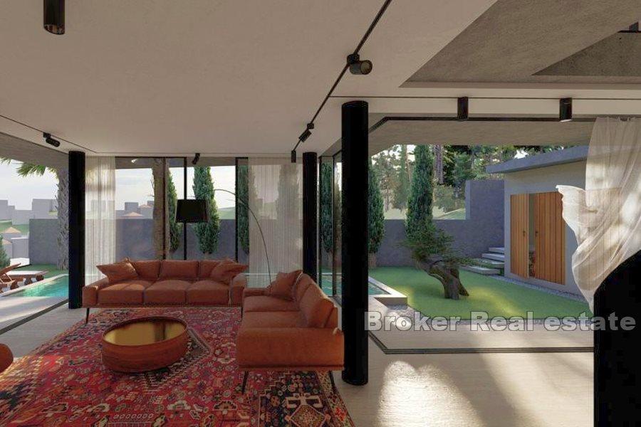 Građevinsko zemljište s projektom kuće